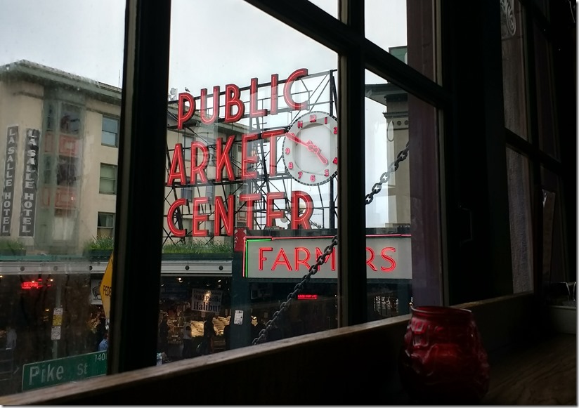 IMG_20180411_164951227_HDR Public Market Center Sign and a clock and buildings on an overcast day