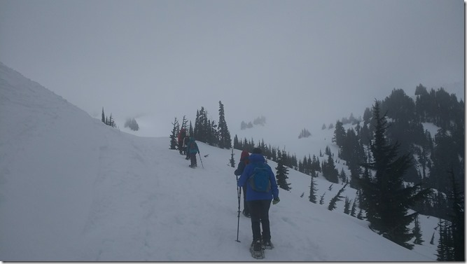 snowshoeing in the fog at Paradise in Mt Rainier National Park Snowshoeing in the fog at Paradise in Mt Rainier National Park