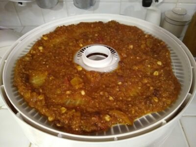 chili on a dehydrator tray