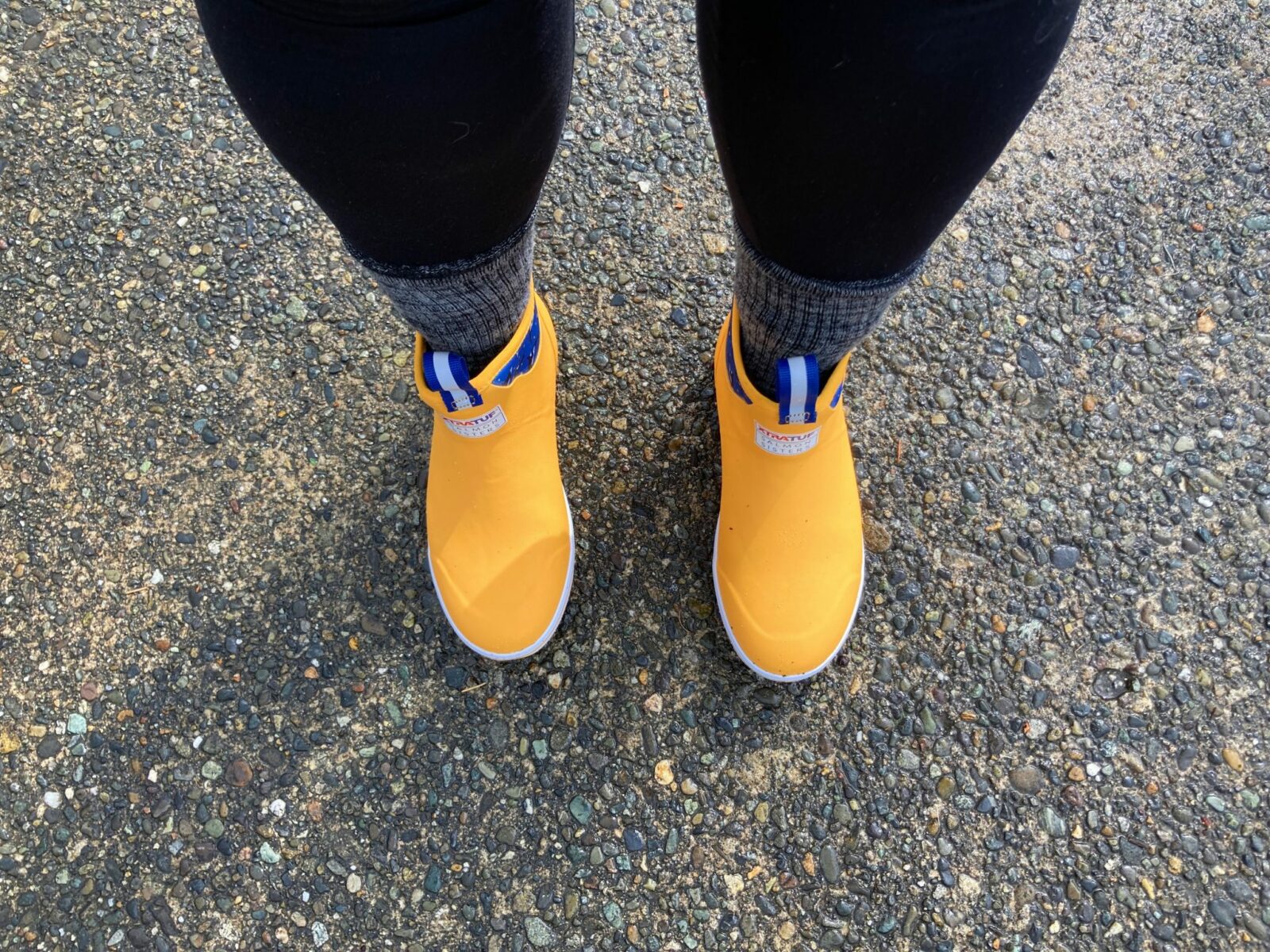 An important consideration in what to pack for seattle is waterproof footwear. These bright yellow waterproof ankle boots are my favorite!